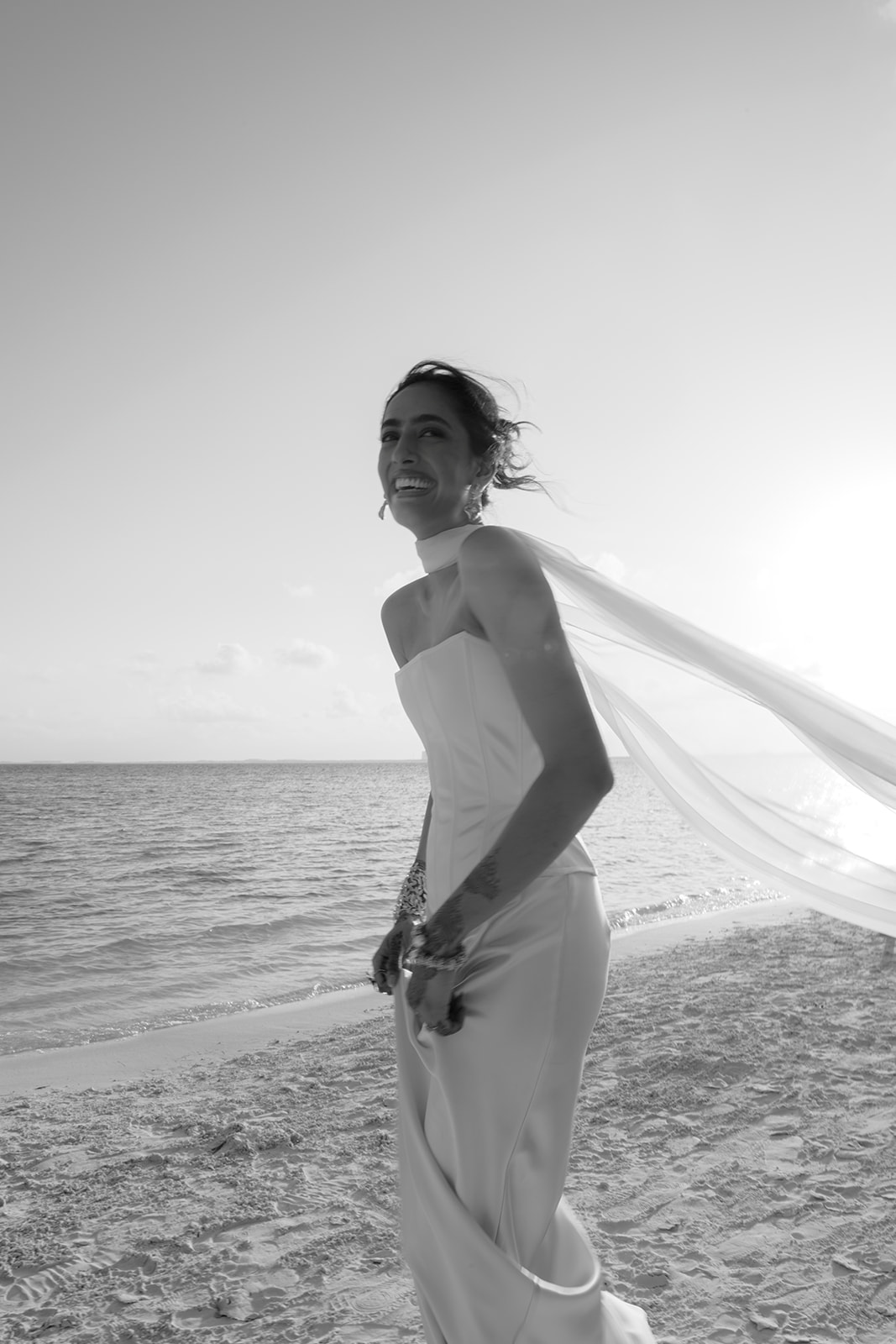 Global luxury event production by DTL EVNTS for a visually stunning beach wedding.