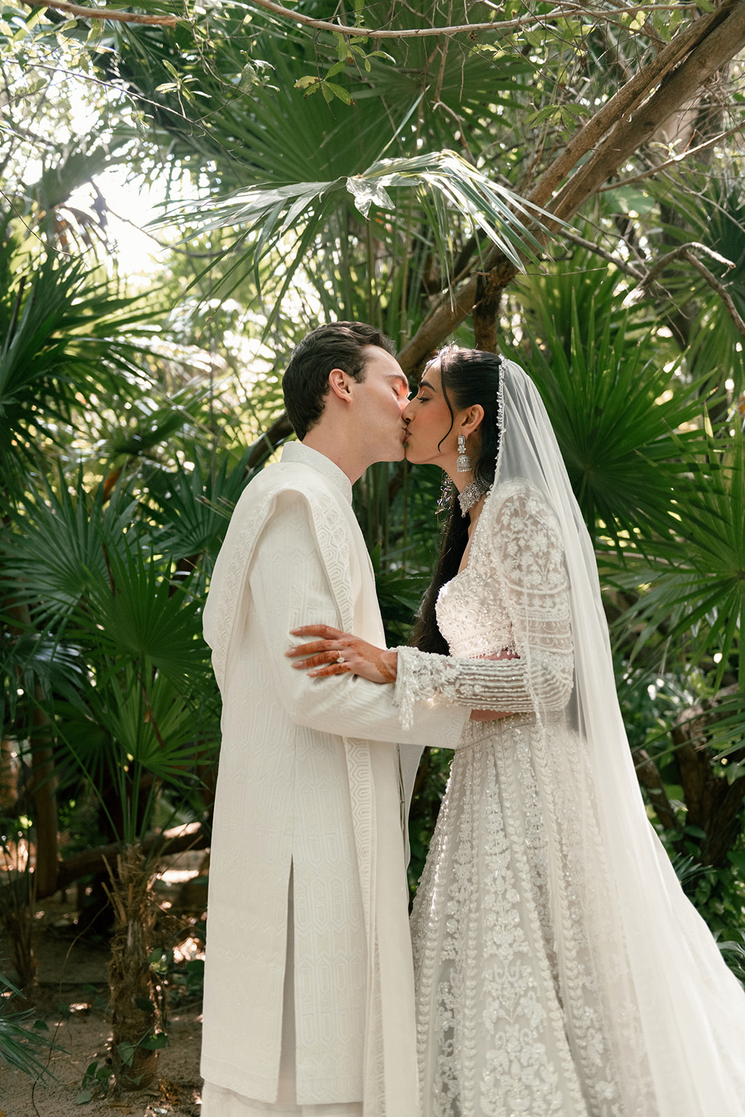Bride and groom sharing an intimate moment at a luxury destination wedding planned by DTL EVNTS.